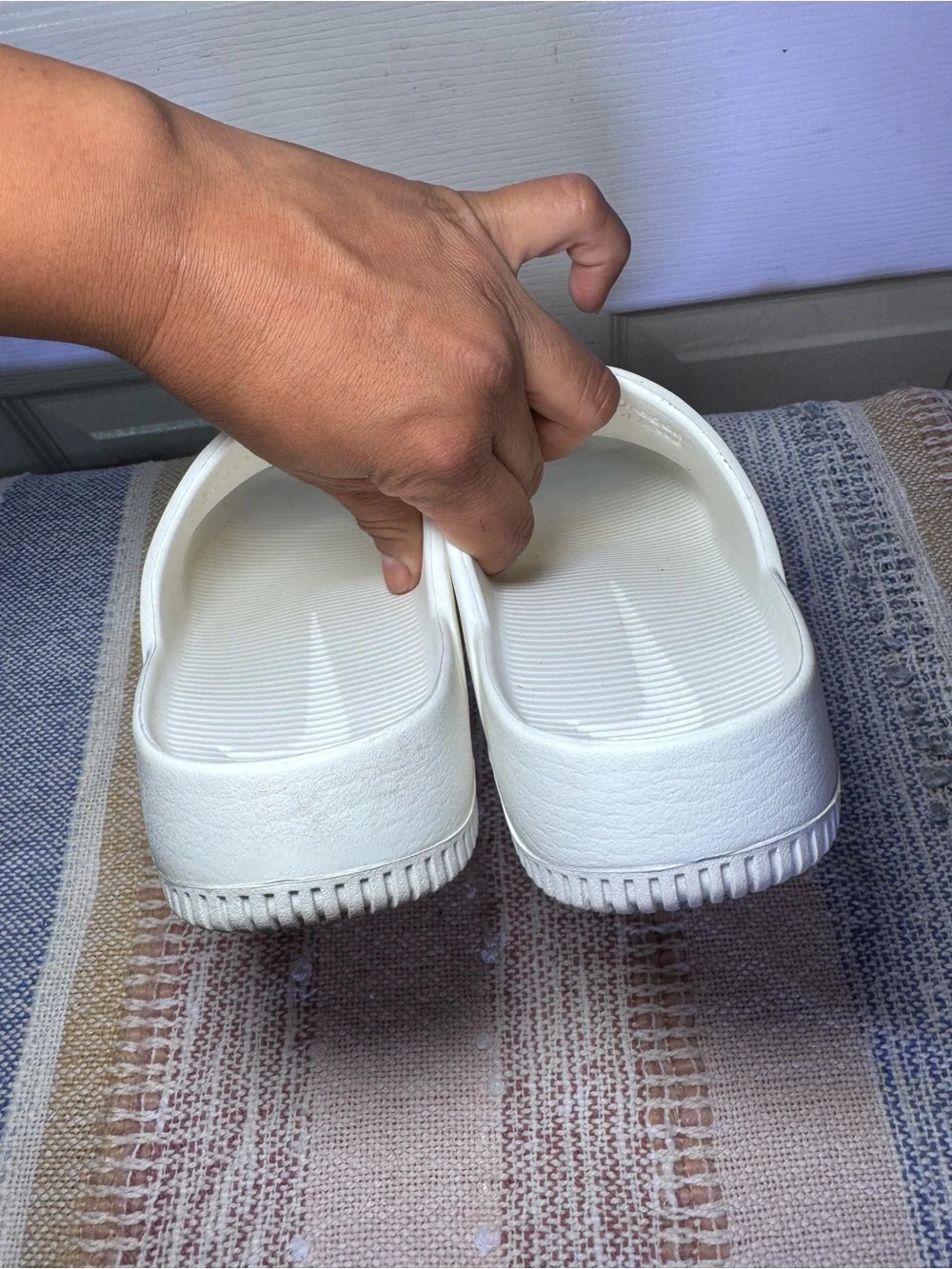 Nike Calm White Slide Sandals.